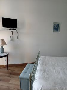 Una cama o camas en una habitación de Ai 4 gatti