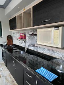 Køkken eller tekøkken på Recanto do Aconchego Prime