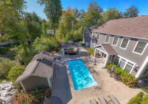an aerial view of a house with a swimming pool at Lamb Haven in South Haven