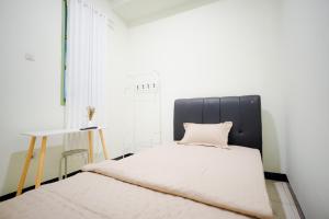 Postel nebo postele na pokoji v ubytování Kod Avlaha Bed & Coffee + 5 fotografií