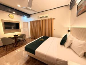 Katil atau katil-katil dalam bilik di The Minimalist F-7 Markaz