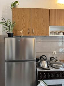 Η κουζίνα ή μικρή κουζίνα στο Perfekt für Familien oder Freunde nahe der Kirche