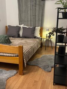 Ένα ή περισσότερα κρεβάτια σε δωμάτιο στο Perfekt für Familien oder Freunde nahe der Kirche