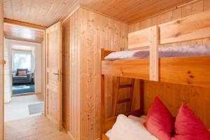 Ένα ή περισσότερα κρεβάτια σε δωμάτιο στο Bungalow 7 - Finnhütte