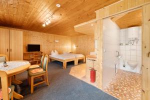 Μια τηλεόραση ή/και κέντρο ψυχαγωγίας στο Bungalow 26 - Kimbucht