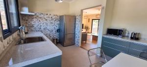 Nhà bếp/bếp nhỏ tại Apartamento a estrenar en Shangrilá - 2 dormitorios