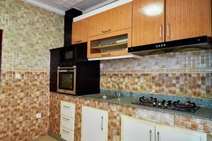 Η κουζίνα ή μικρή κουζίνα στο Convivium Home Hotel Appart