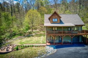 an aerial view of a house with a deck at Sugar Rush in Sugar Mountain