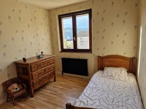 Ein Bett oder Betten in einem Zimmer der Unterkunft Family home