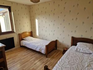 Ein Bett oder Betten in einem Zimmer der Unterkunft Family home + 4 Fotos