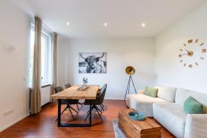 Posezení v ubytování Weinstraßenzauber Altbauwohnung mitten in NW
