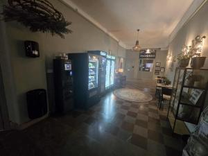 a room with two vending machines in a store at Stora Ekeberg vandrarhem in Axvall