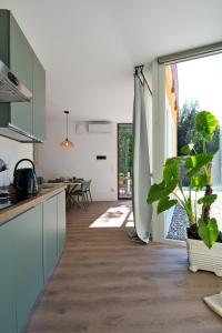 Kuchyň nebo kuchyňský kout v ubytování Residence Magnolia