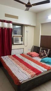 Ένα ή περισσότερα κρεβάτια σε δωμάτιο στο Live with full Pace and Enjoy