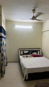 Ένα ή περισσότερα κρεβάτια σε δωμάτιο στο Live with full Pace and Enjoy