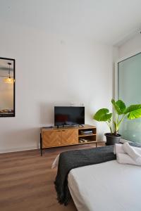 TV a/nebo společenská místnost v ubytování Residence Magnolia