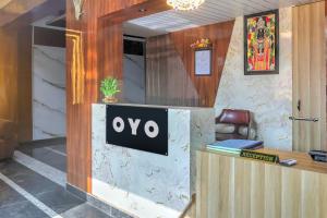 an office with a sign that says oxy at SPOT ON Hotel Blue Diamond Inn in Bihta