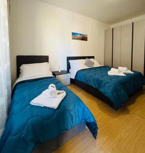 Ένα ή περισσότερα κρεβάτια σε δωμάτιο στο Casa vacanza Elena 3