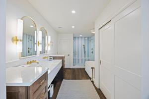 a bathroom with two sinks and a tub at WS4456: 4456 Windswept in Kiawah Island +62 photos