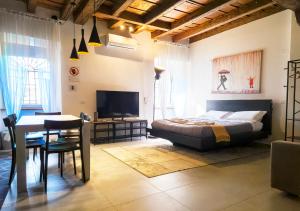 Ένα ή περισσότερα κρεβάτια σε δωμάτιο στο 15th Century Loft - Verona City Centre
