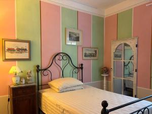 เตียงในห้องที่ Casa delle Ortensie