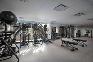 a gym with several treadmills and exercise equipment at Courtyard by Marriott San Diego Downtown Little Italy in San Diego