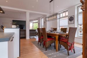 Dapur atau dapur kecil di LüneBase Loft - Traum zwischen Altstadt und City