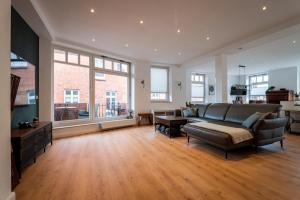 Ruang duduk di LüneBase Loft - Traum zwischen Altstadt und City