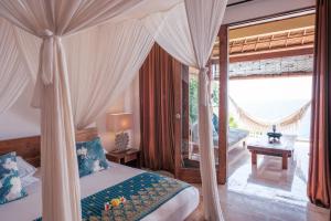 Giường trong phòng chung tại Villa Aquamarine +71 ảnh