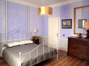 เตียงในห้องที่ Casa delle Ortensie +2 ภาพ