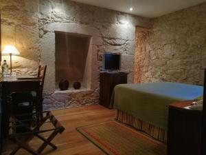 TV/Unterhaltungsangebot in der Unterkunft Hotel Pazo de Lestrove by Pousadas de Compostela