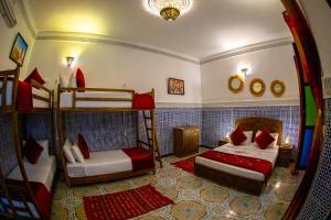 Katil atau katil-katil dalam bilik di Riad Dar Amir