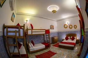 Katil atau katil-katil dalam bilik di Riad Dar Amir