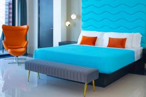 Ένα ή περισσότερα κρεβάτια σε δωμάτιο στο Zenses Hotel