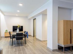 Μια τηλεόραση ή/και κέντρο ψυχαγωγίας στο Novotel Parma Centro +150 φωτογραφίες