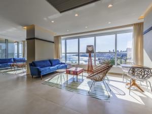 Khu vực ghế ngồi tại Novotel Salvador Rio Vermelho