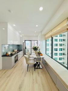 Η κουζίνα ή μικρή κουζίνα στο The Wave House Nha Trang +9 φωτογραφίες