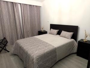 Ένα ή περισσότερα κρεβάτια σε δωμάτιο στο Casa do Margalho