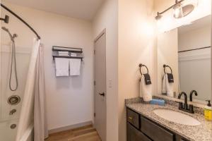 a bathroom with a sink and a shower at Calling Me Home in Blowing Rock +43 photos