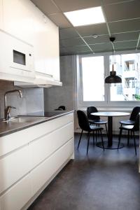 Η κουζίνα ή μικρή κουζίνα στο Lägenhetshotellet Fridhem