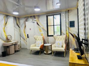 TV a/nebo společenská místnost v ubytování Fini Palace