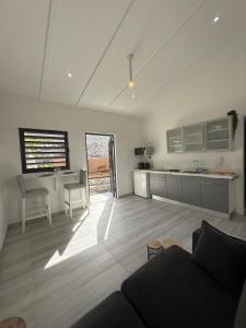 Kuchyň nebo kuchyňský kout v ubytování Boho Garden Jan Thiel Apt C + 6 fotografií