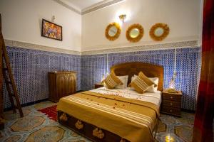 Katil atau katil-katil dalam bilik di Riad Dar Amir +6 gambar