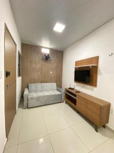 Et tv og/eller underholdning på Functional and well-located COP30 apartment