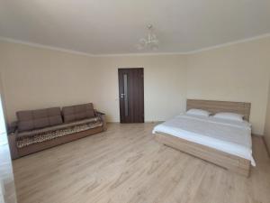 Postel nebo postele na pokoji v ubytování ЖК Центральний біля Авангарду