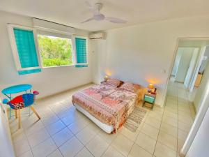 En eller flere senge i et værelse på Appartement - Vue mer et montagne