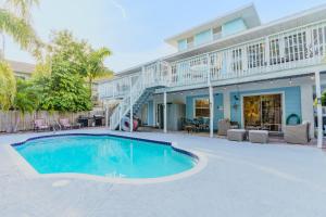 a swimming pool in front of a house at 1010 Point of Rock in Point O'Rocks