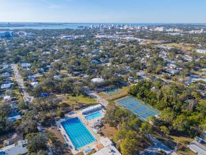 an overhead view of a pool at a resort at New Contruction Modern Outdoor Oasis Prime Location in Southgate