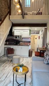 a living room with a couch and a table at The Casan in Letterkenny