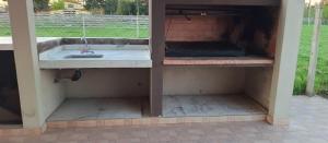 a kitchen with a sink inside of a house at Comoda quinta en El Pato in El Pato
